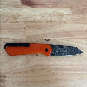 Tactica Orange Folding Knife with Black and Silver Blade
